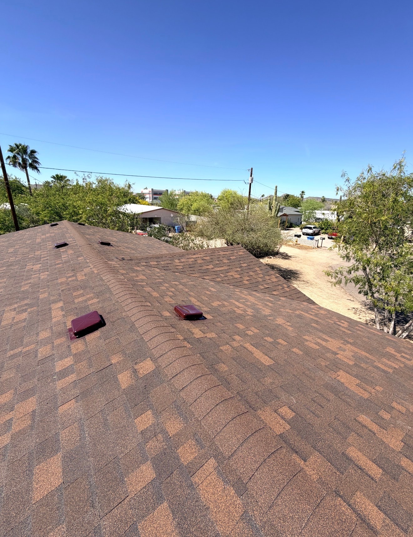Completed shingle roofing installation on residential home
